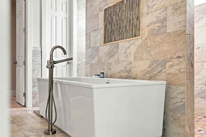 Freestanding soaking tub in the spa bath